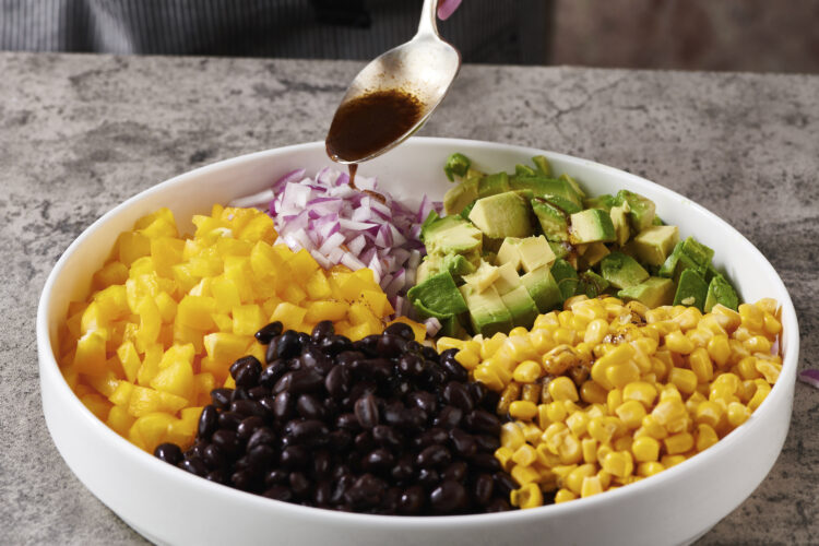 This bean salad known as Cowboy Caviar is a protein-packed  addition to any  summer cookout